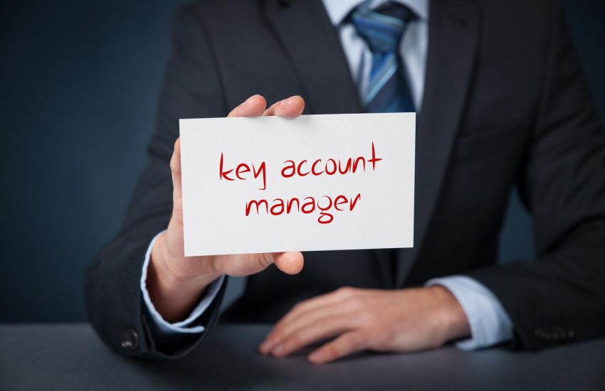 Key account manager advertisement concept. Man show card with text key account manager.